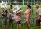 Após um mês da tsunami da lama, a fila pela água potável em Minas