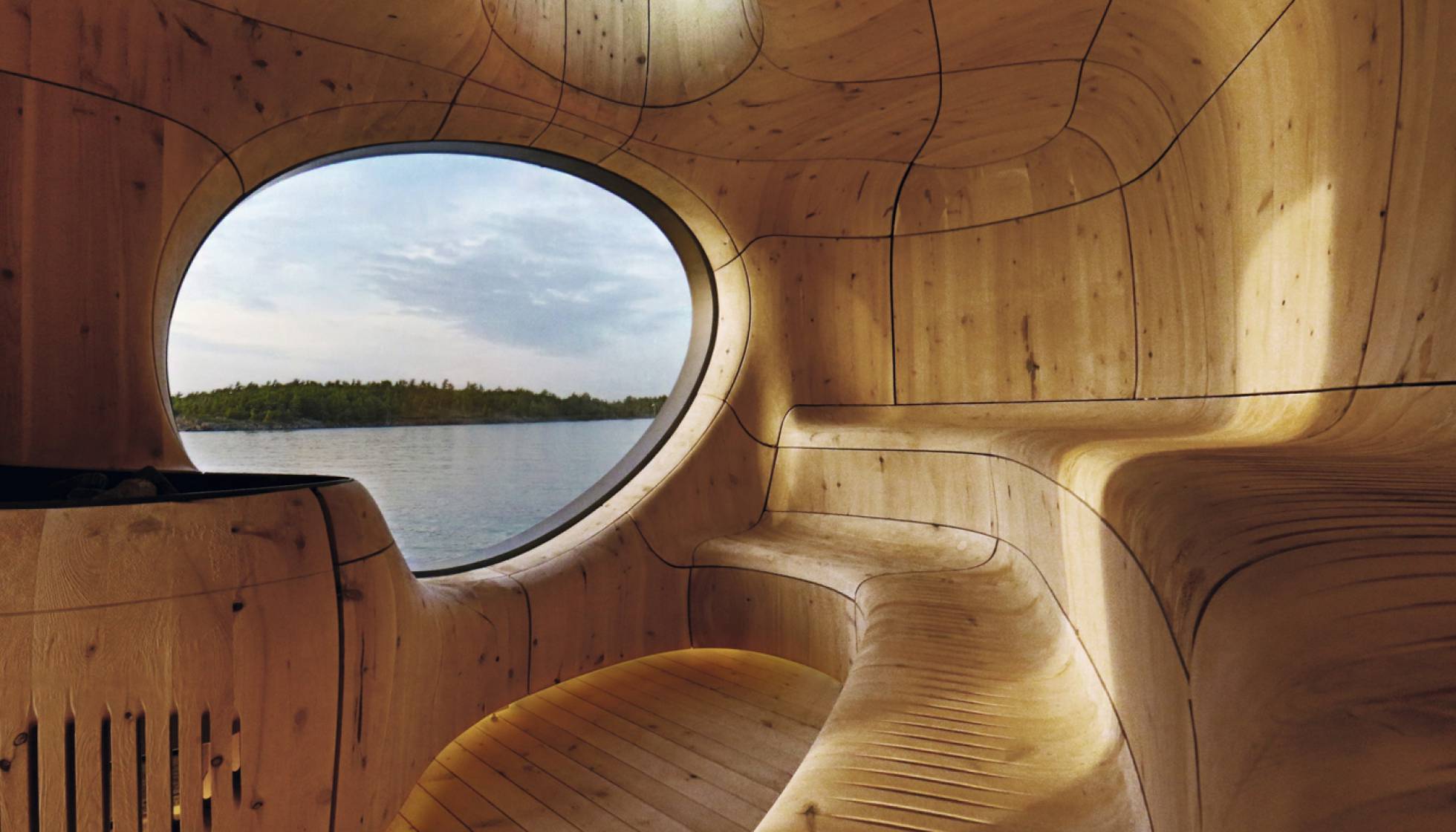 Sauna Grotto. O estúdio Partisans trabalhou com uma técnica japonesa – Shou Sugi Ban – que corrói a madeira dando-lhe uma aparência escultural. Como uma caverna escavada, esta sauna de Toronto (Canadá) está formada por painéis de cedro encaixados.