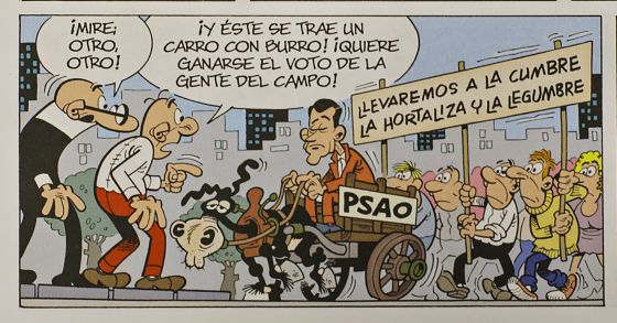 Pedro Sánchez tirant d'un carro amb el qual fa campanya pel PSAO.
