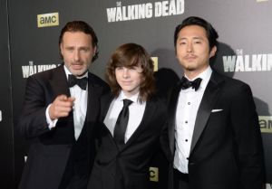 Andrew Lincoln, Chandler Riggs y Steven Yeun, en el evento del Madison Square Garden.