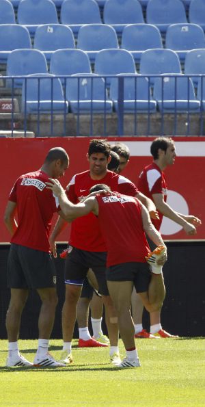 Los jugadores del Atlético de Madrid durante el entrenamiento