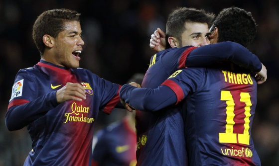 Jonathan (e) celebra un gol amb Villa i Thiago, el 2012.