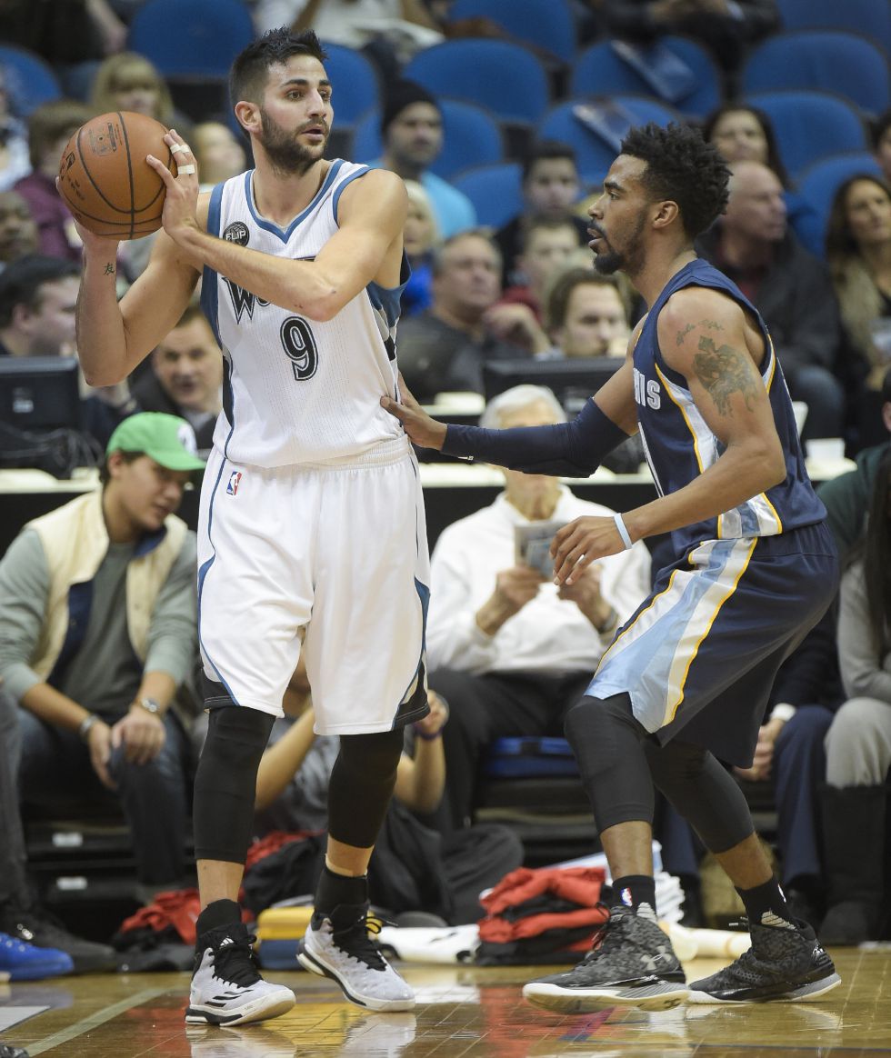 Ricky Rubio y Conley.