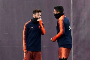 Messi, amb Suárez, en l'entrenament del Barça.