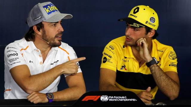 Fernando Alonso junto a Carlos Sainz.