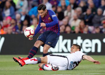 El Barcelona se impone al Rayo con goles de Piqué, Messi y Suárez