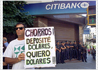 'Haga patria, queme un banco'