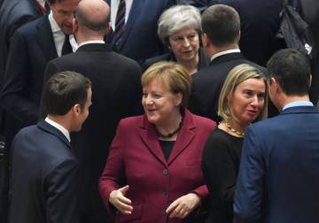 La canciller alemana, Angela Merkel, y el presidente francés, Emmanuel Macron, durante la cumbre europea.