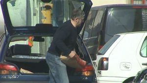 This man said he couldn't continue working in his job as a messenger after injuring his arm in an accident. The insurance company managed to catch him on film carrying bags of cement. This man said he couldn't continue working in his job as a messenger after injuring his arm in an accident. The insurance company managed to catch him on film carrying bags of cement.