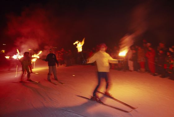 A nocturnal skiing display at La Molina resort in the Catalan Pyrenees. A nocturnal skiing display at La Molina resort in the Catalan Pyrenees.