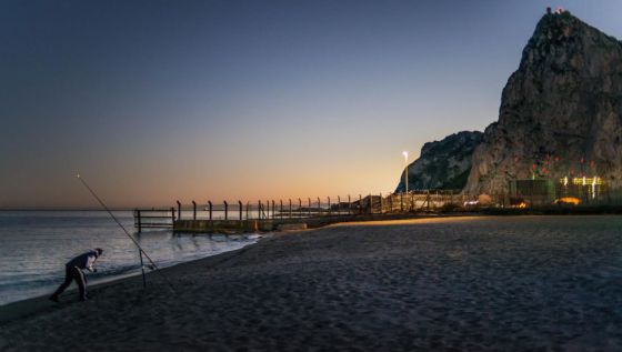 The Rock of Gibraltar, overlooking the Strait.