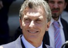 Argentina's President Mauricio Macri waves as he leaves Buenos Aires' cathedral December 11, 2015. Days into his presidency, Macri faces his first big threats as he seeks to fix Argentina's ailing economy: inflation and recession. In his first policy moves since taking office on December 10, the free markets advocate made good on his promises to eliminate capital controls and cut hefty export taxes. Picture taken December 11, 2015. REUTERSMarcos Brindicci