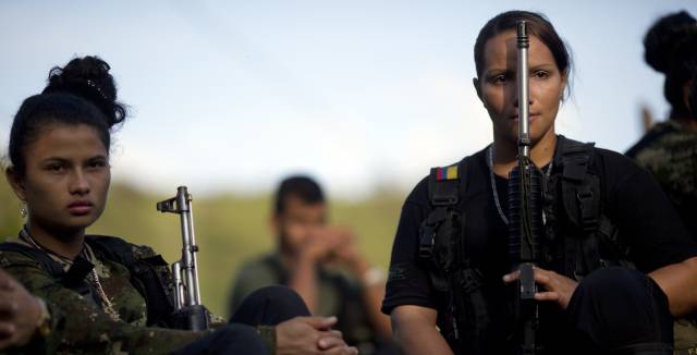 Two members of the FARC. Two members of the FARC.