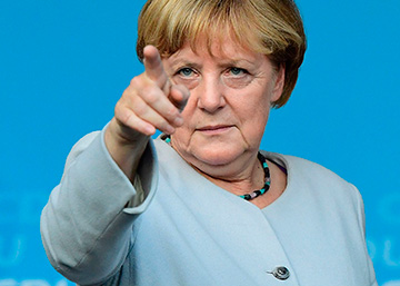 La canciller Angela Merkel, junto a Frank-Walter Steinmeier, Sigmar Gabriel y Horst Seehofer, el miércoles en Berlín.