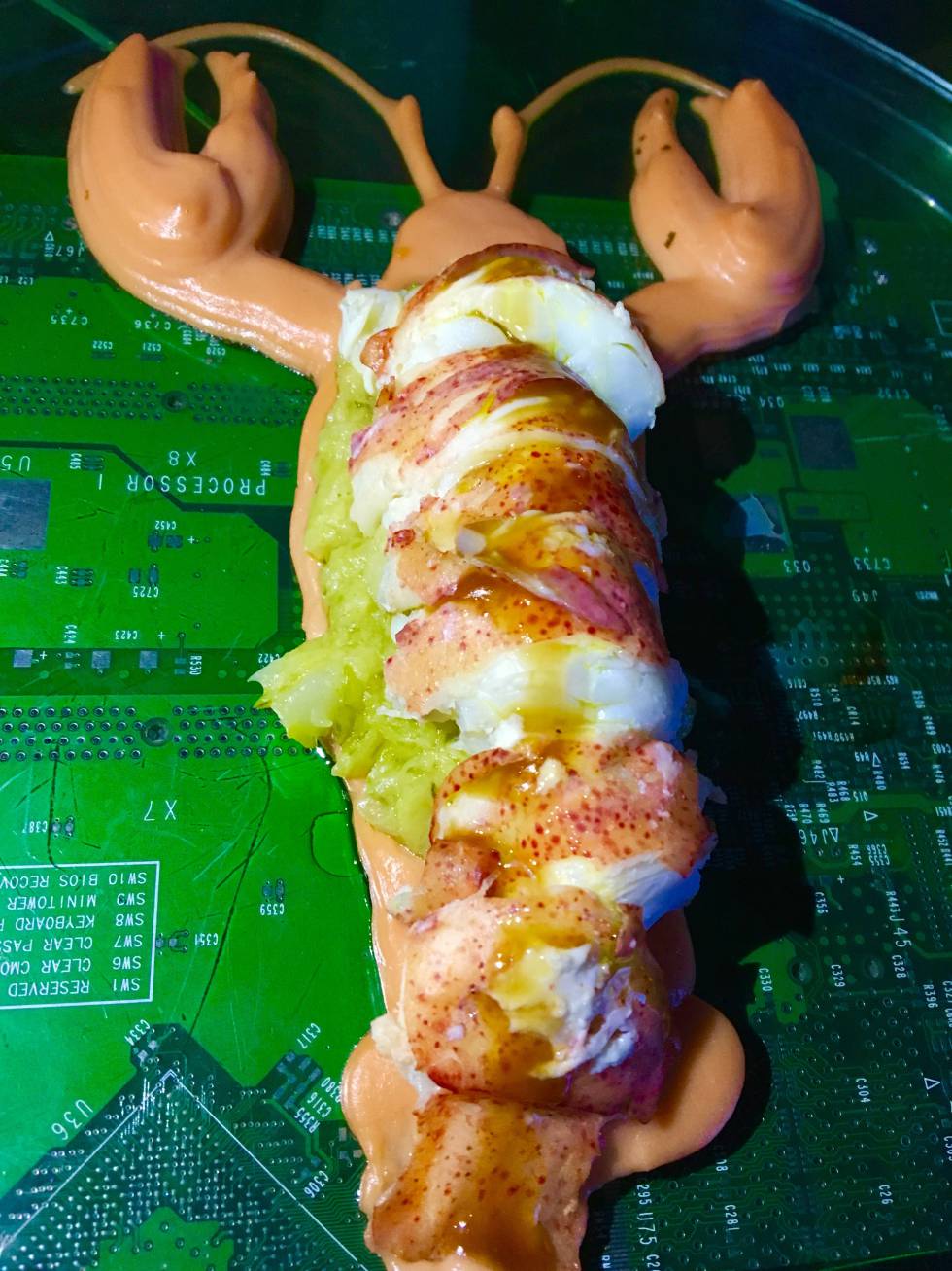 BOGAVANTE SOBRE TRINXAT Y JUGO DE POLLO CAPEL