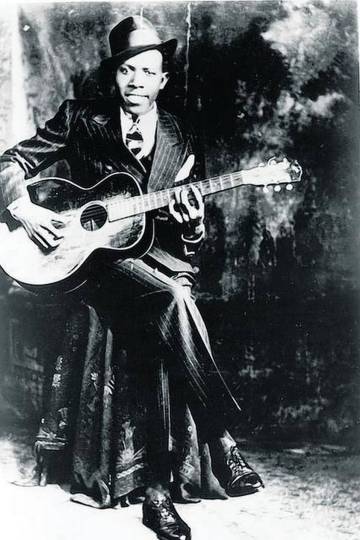 Robert Johnson, en una de las dos fotos que solo existen de él. Vendió su alma al diablo para ser el mejor guitarrista de blues.