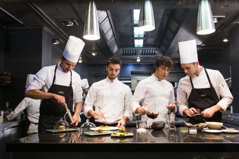 Jordi Cruz (second from right) in his restaurant, ABaC in Barcelona.