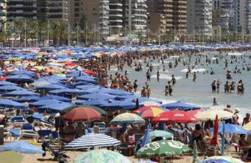 A packed beach in Benidorm.
