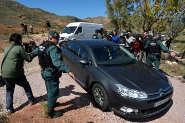 Police enter the property in Rodalquilar where the child's body was allegedly concealed.