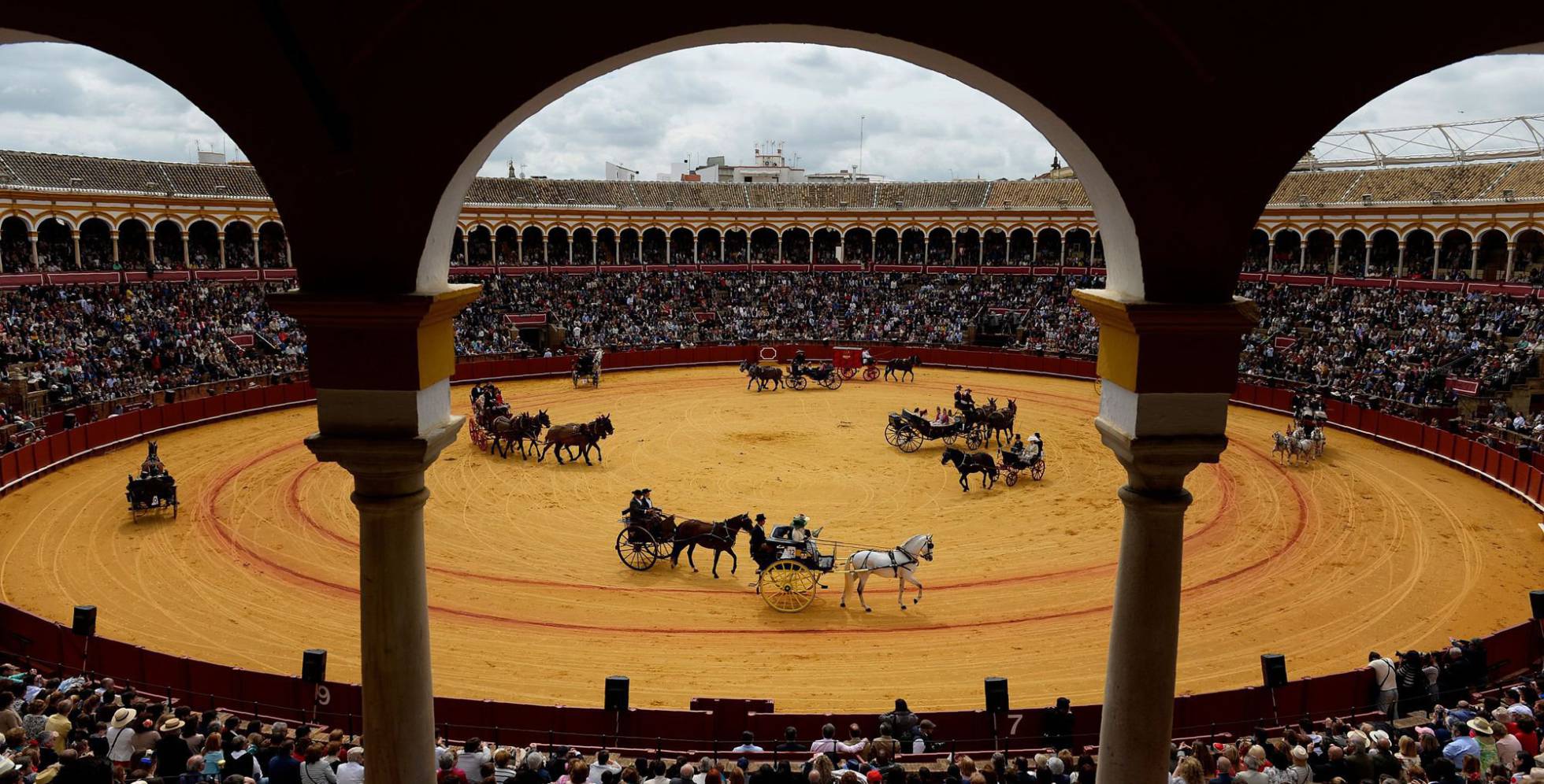 Horse-drawn carriages participate in the XXXIII