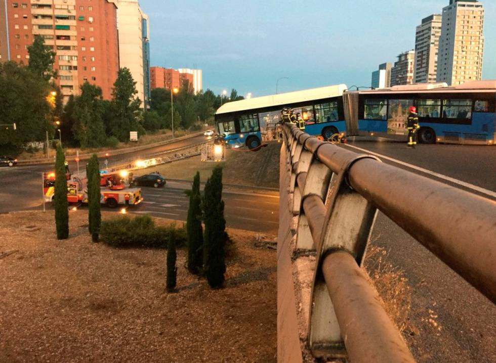 A photo from the Madrid emergency services’ Twitter feed of the bus hanging off a bridge after the accident.