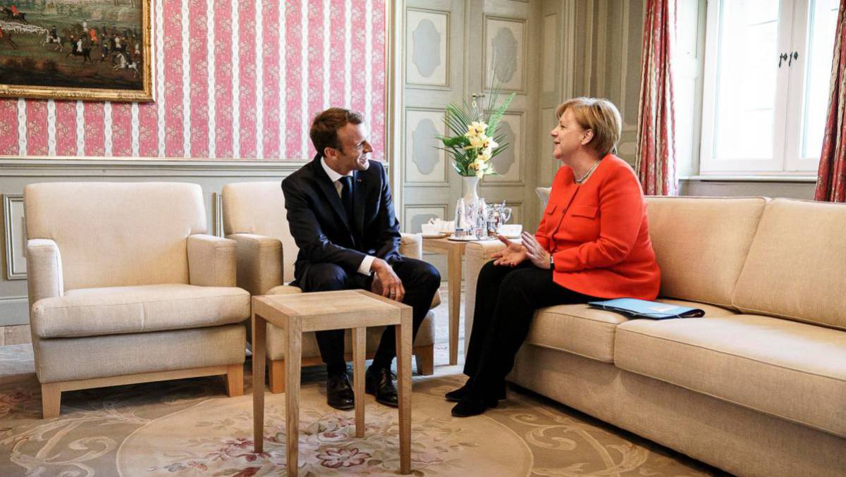 Emmanuel Macron y Angela Merkel.