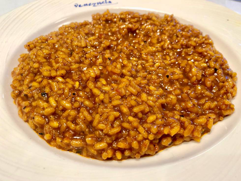 PLATO DE ARROZ AL CALDERO EN EL RESTAURANTE VENEZUELA. CUARTO SERVICIO EN LA DEGUSTACIÓN DE ARROZ AL CALDERO CAPEL