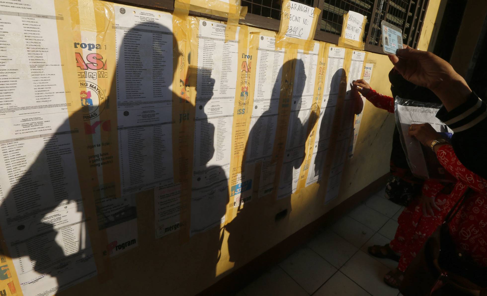 La jornada electoral de las elecciones municipales y legislativas de Filipinas, en imágenes