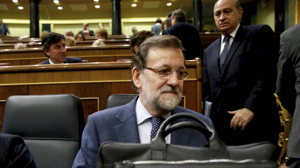 Rajoy y Fernández Díaz, en 2015.