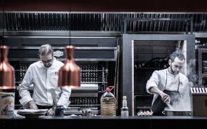 Chefs at work in the kitchen at Aire.