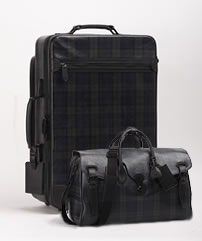 Trolley y bolsa de viaje cuadros escoceses RALPH LAUREN 3.500€ y 2.700€