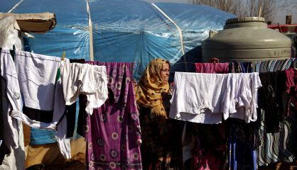 Una mujer siria, en el campo de Kab Elias, en el este de Líbano. Una mujer siria, en el campo de Kab Elias, en el este de Líbano.