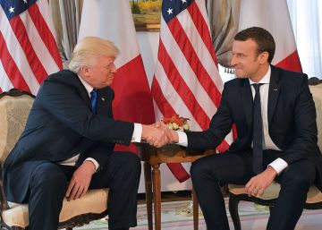 Trump tenta diminuir a tensão com Macron em viagem relâmpago a Paris Trump tenta diminuir a tensão com Macron em viagem relâmpago a Paris