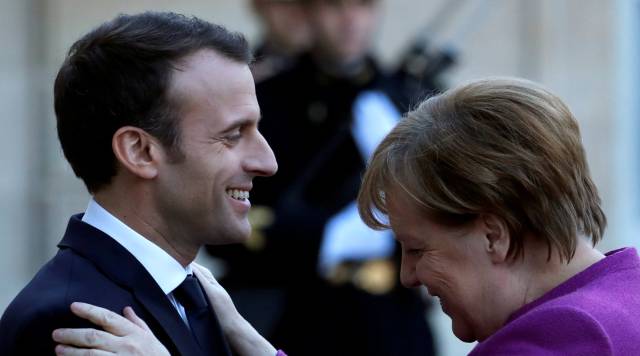 El presidente francés, Emmanuel Macron, y la canciller alemana, Angela Merkel, en París el pasado marzo.