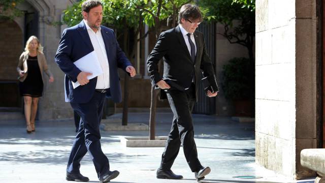 El vicepresidente de la Generalitat, Oriol Junqueras, y el presidente, Carles Puigdemont, este junio.
