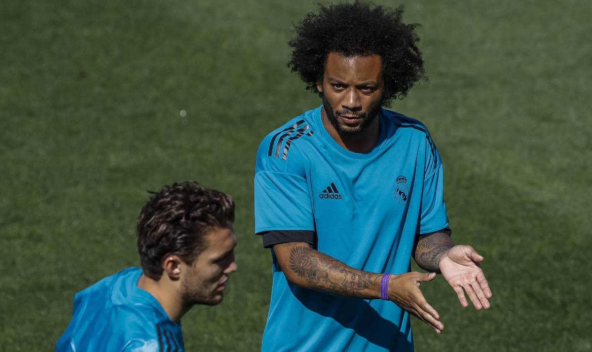 Marcelo (D) junto a Kovacic en el entrenamiento de este martes.