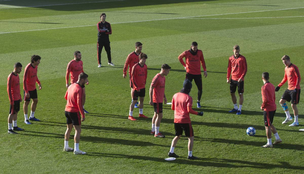 Los jugadores del Madrid durante el último entrenamiento.