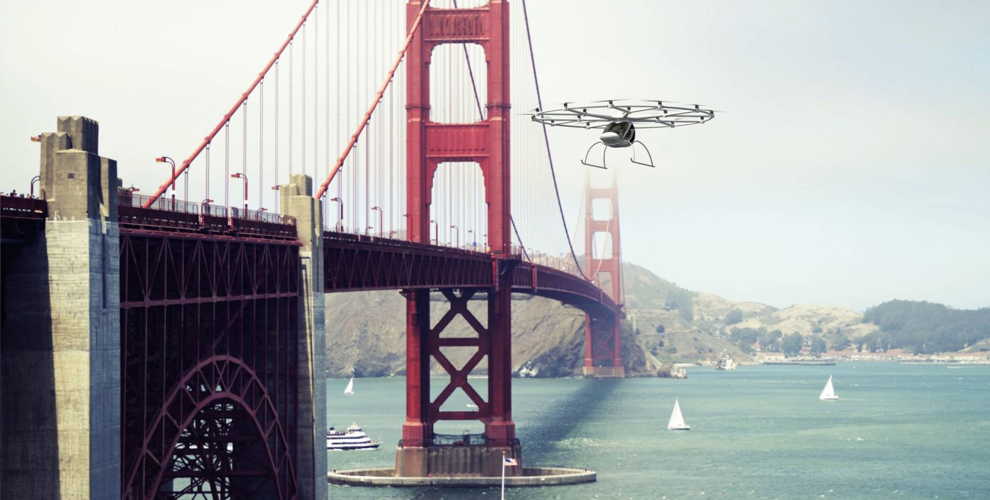Simulação de voo de um Volocopter sobre San Francisco. Esses carros voadores já fizeram o seu primeiro voo. Simulação de voo de um Volocopter sobre San Francisco. Esses carros voadores já fizeram o seu primeiro voo.