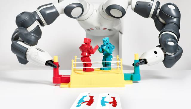 Ilustración conceptual del estudio, con una máquina manejando dos robots boxeadores tras aprender de dos viñetas los movimientos que tienen que cumplir.