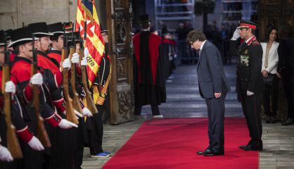 Premier Carles Puigdemont enters the Palau de la Generalitat.