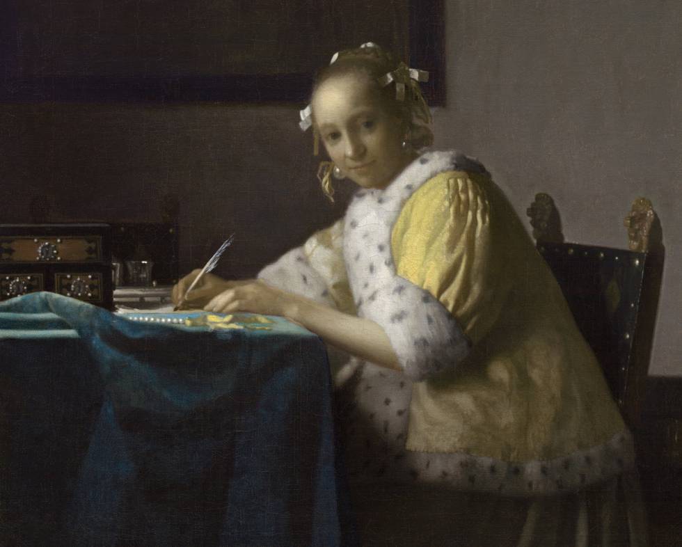 'Mujer de amarillo escribiendo una carta', cuadro de Vermeer de 1665.