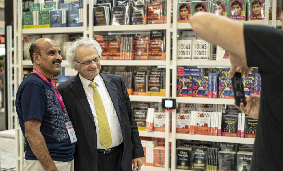The writer Amin Maalouf poses for a photo.
