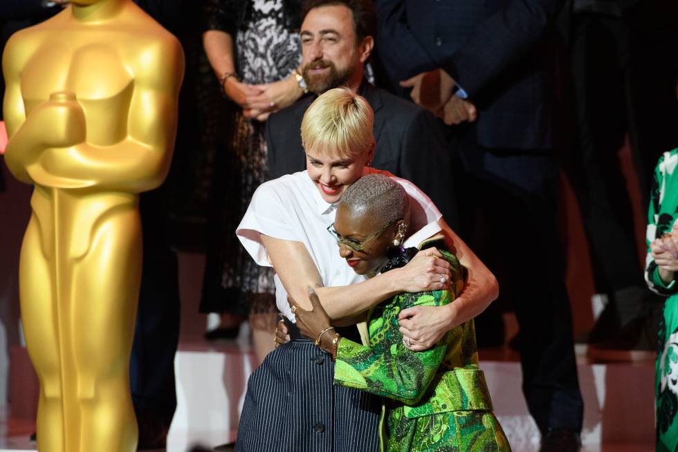 Charlize Theron hugs Cynthia Erivo in the photo.