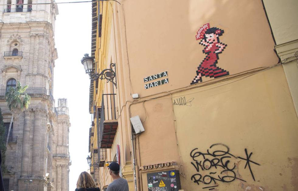 One of the mosaics placed by the artist Invader in Malaga.