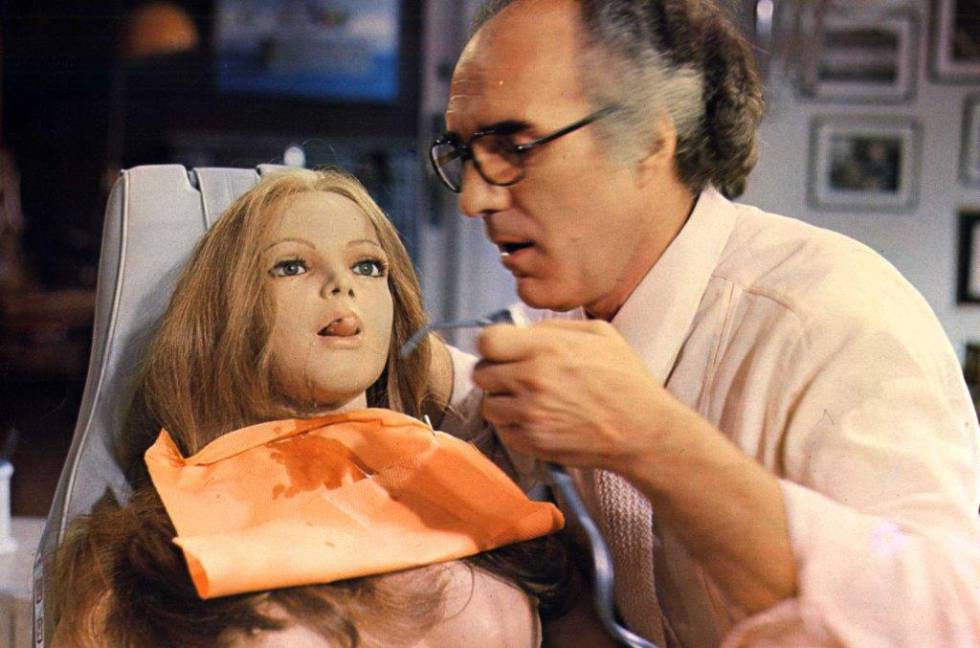 Actor Michel Piccoli and his doll, in 'Life size' (1973).