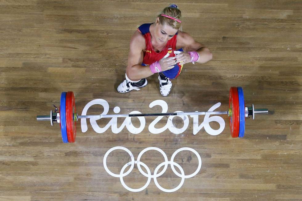 Medalla de oro en dobles de tenis y bronce en halterofilia