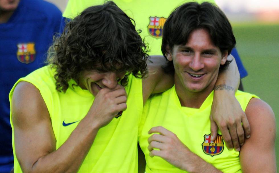 Puyol y Messi en 2009.