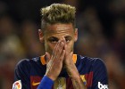 Barcelona's Brazilian forward Neymar reacts after a failed attempt on a penalty kick during the Spanish Copa del Rey (King's Cup) football match FC Barcelona vs Valencia CF at the Camp Nou stadium in Barcelona on February 3, 2016. AFP PHOTO  LLUIS GENE
