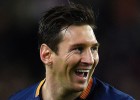Barcelona's Argentinian forward Lionel Messi smiles after scoring a goal during the Spanish league football match FC Barcelona vs RC Celta de Vigo at the Camp Nou stadium in Barcelona on February 14, 2016.    AFP  LLUIS GENE