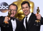 Josh Singer (R) and Tom McCarthy pose with their trophies for Original Screenplay, 